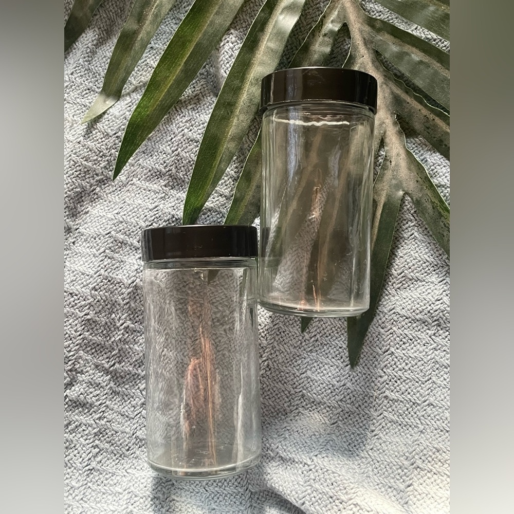 Set of Two Clear Glass Jars with Black Lids